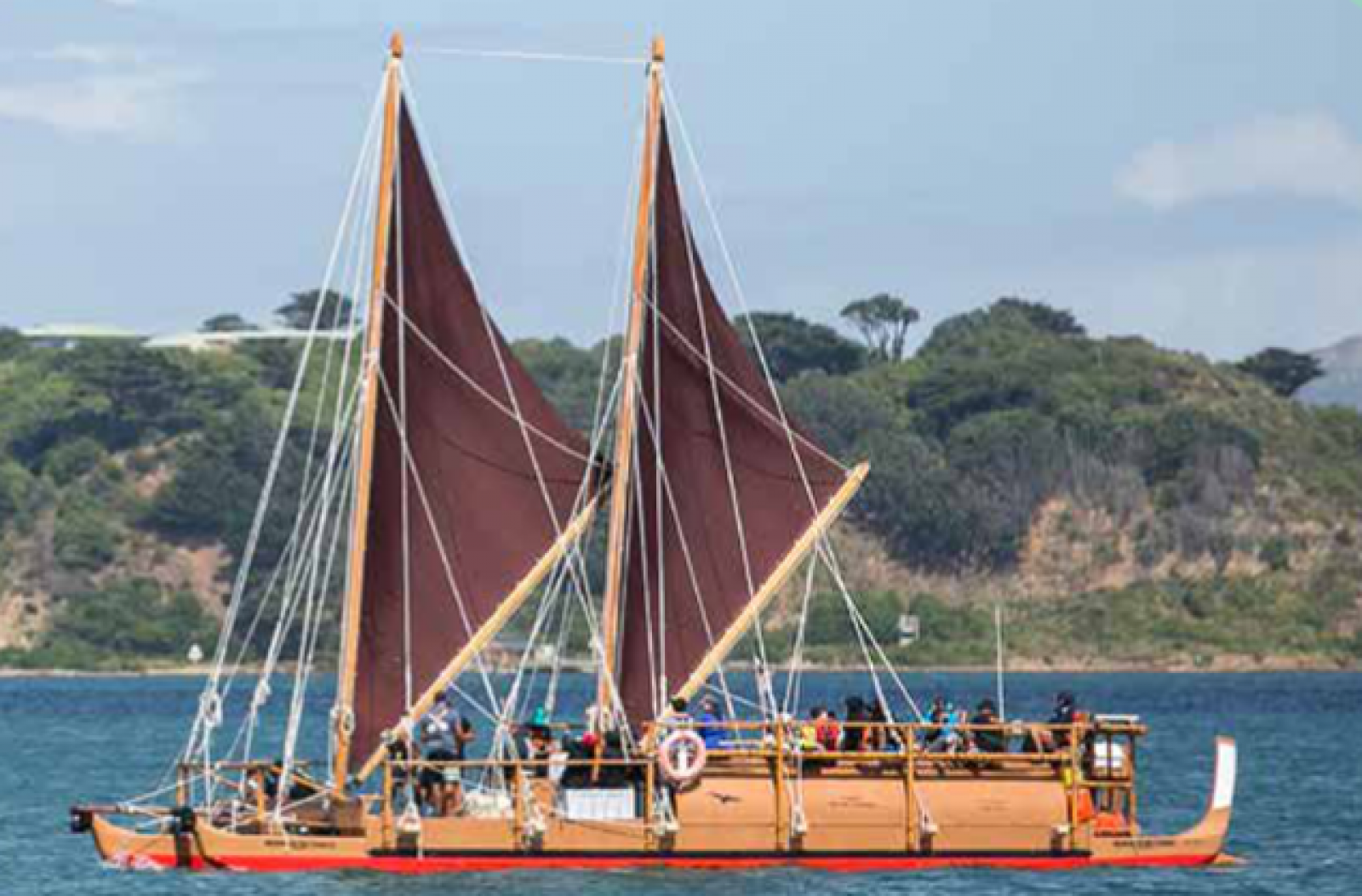 A traditional boat sails on Wellington harbour banner image