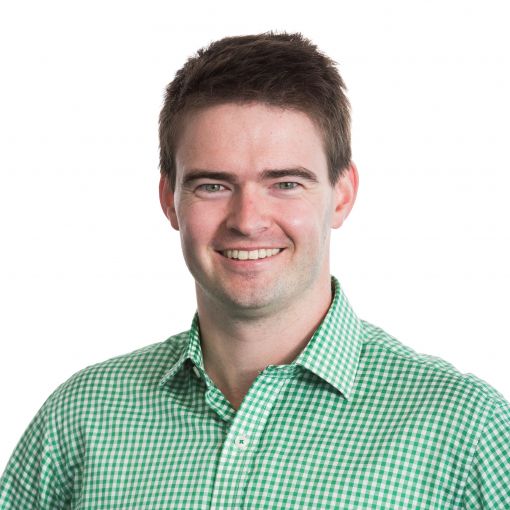 A professional headshot of engineer Chris Mills