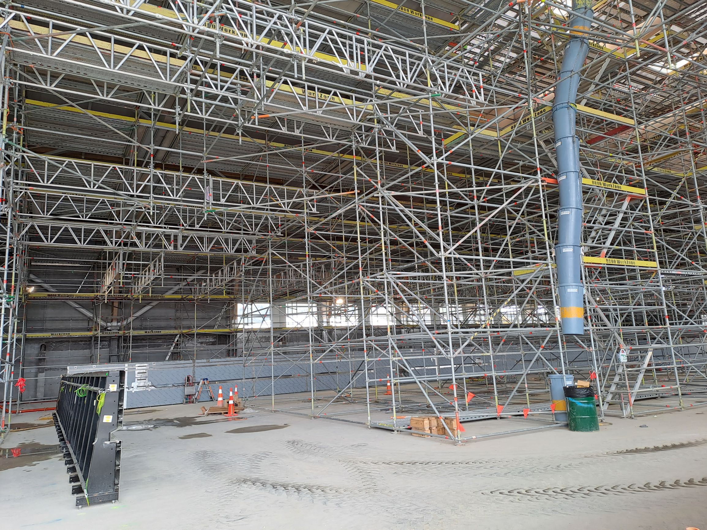 View of the birdcage scaffolding inside the main pool hall in September 2023.