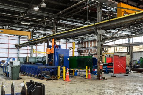 Inside the factory at Petone Engineering showing the heavy machinery.