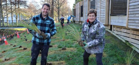 Mayor-Campbell-Barry-and-Deputy-Mayor-Tui-Lewis-get-stuck-in-to-some-tree-planting.jpg
