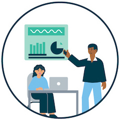 Two colleagues reviewing charts and data during a presentation